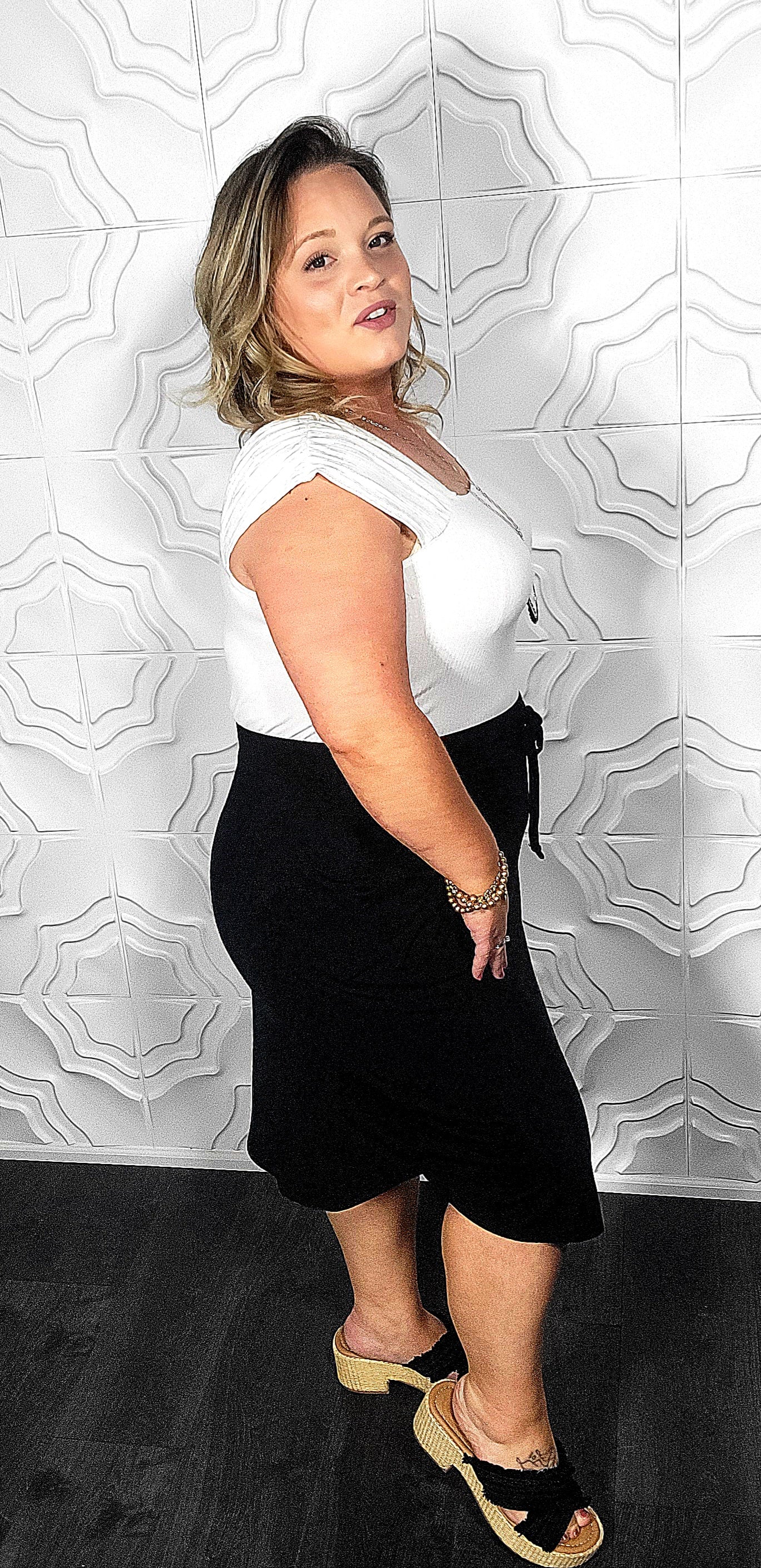 Tulip Hem Skirt with Side Pockets in Black